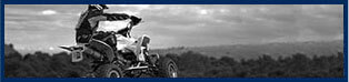 A person riding a 4-wheeler.